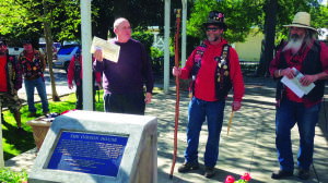 Dave Flory, left, executive director of the Gibson House Museum, accepts honorary membership to the E Clampus Vitus 1841 Chapter during a plaque dedication ...photograph by Daily Democrat